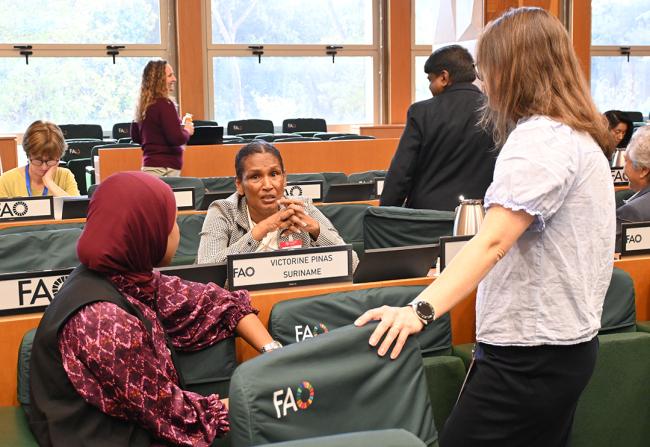 CRC member Victorine Pinas, Suriname, discusses with members Saida Ech-Chayeb, Morocco, and Irene Sørvik Malme, Norway- CRIC21 - 26Sep2025