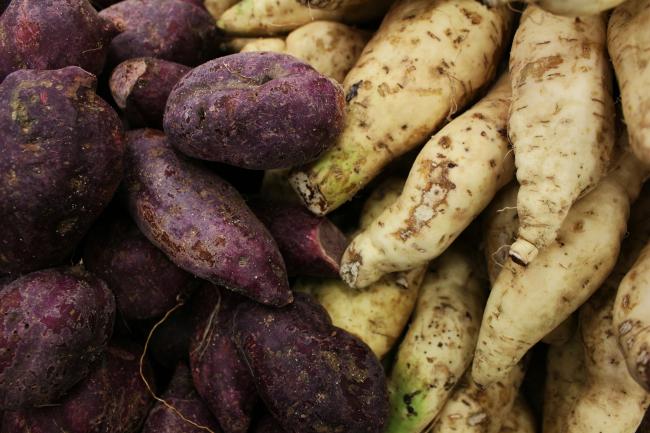 Pile of purple and white sweet potatoes