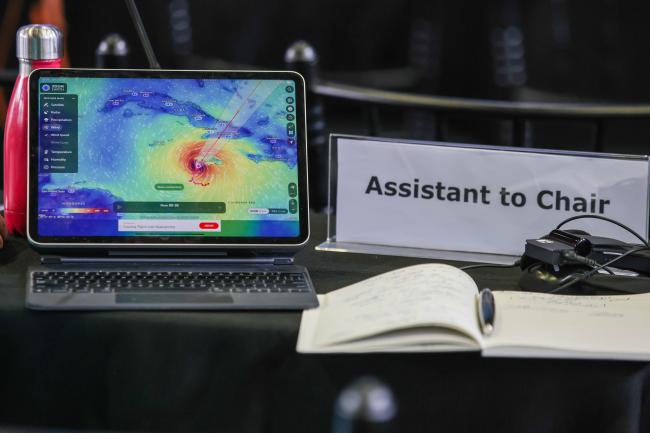 Delegate follow developments on the hurricane in Jamaica. 