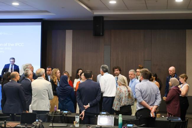 Delegates huddle