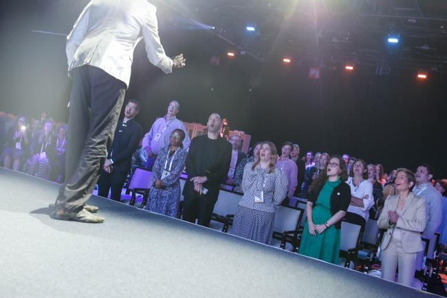 Participants were encouraged to stand up for an ice-breaker game. 