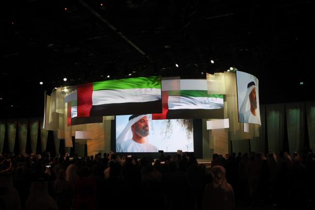 View of the room during the hearing of the national anthem of the UAE