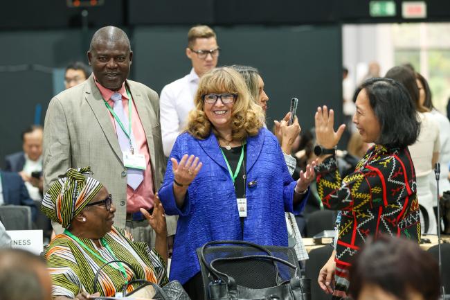 SBSTTA Chair Jean Bruno Mikissa, Gabon, and CBD Executive Secretary Astrid Schomaker discussing with Indigenous Peoples' representatives