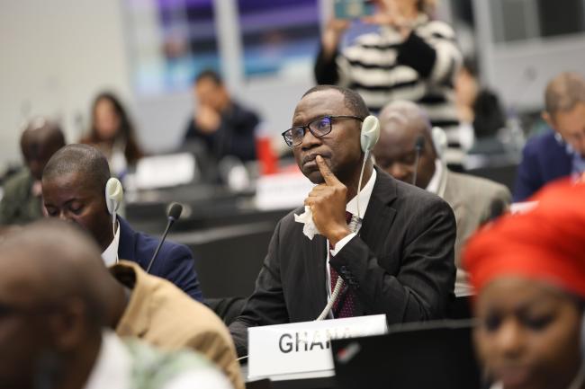 Delegates during Session 9 