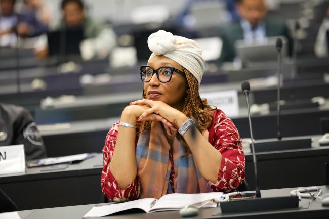 Delegates during Session 9 