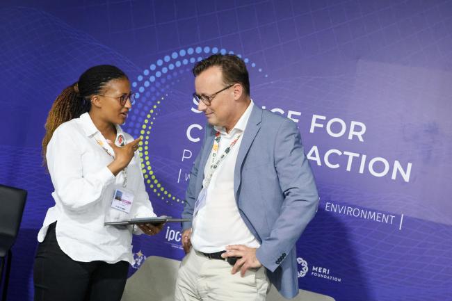Lucy Njuguna, IPCC Lead Author and technical expert under the UAE–Belém work programme for the Global Goal on Adaptation, CGIAR, and Stefan Uhlenbrook, Director of Hydrology, Water and Cryosphere, WMO  -