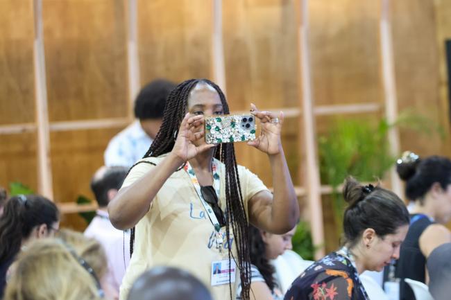 A participant takes a picture