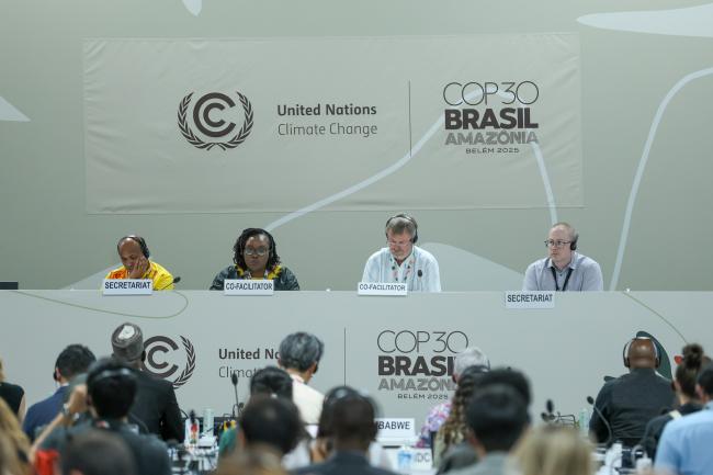 From L-R: Perumal Arumugam, UNFCCC Secretariat; Informal consultations on Paris Agreement Article 6.2 Co-Facilitators Pacifica Achieng Ogola, Kenya, and Peer Stiansen, Norway; and Phillip Eyre, UNFCCC Secretariat