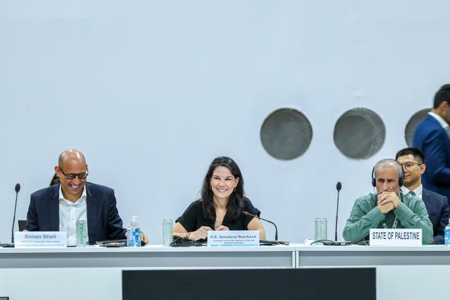From L-R: UNFCCC Executive Secretary Simon Stiell; Annalena Baerbock, President of the 80th session of the UN General Assembly; and Ahmed Abuthaher, State of Palestine