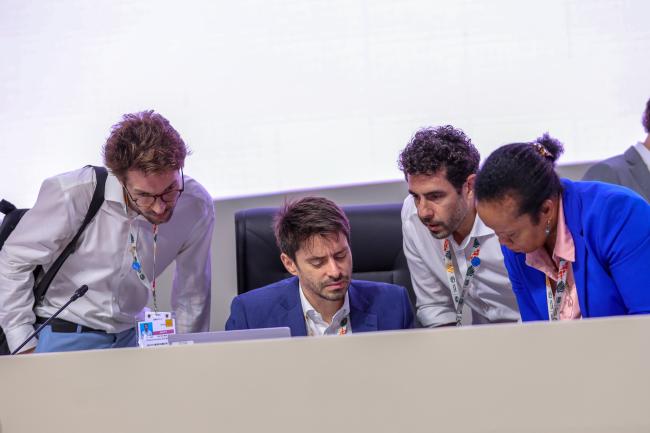 Túlio Andrade, COP 30 Presidency, conferring with his team