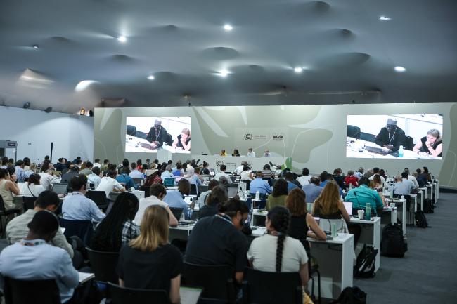View of the room during informal consultations on Paris Agreement Article 6.2