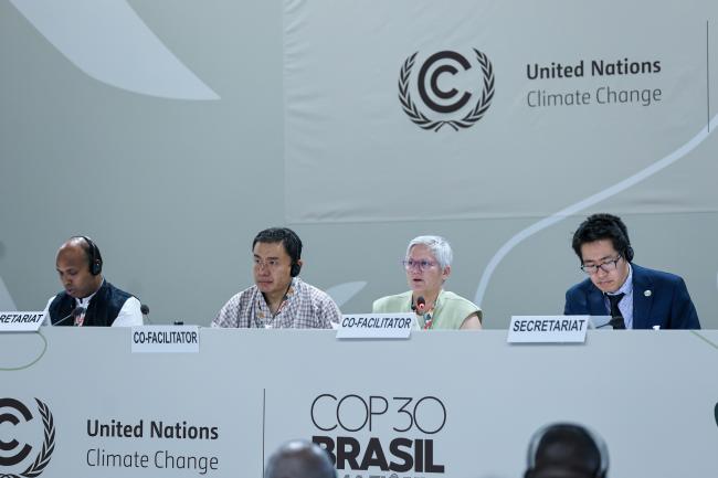 From L-R: Perumal Arumugam, UNFCCC Secretariat; Co-Facilitators for informal consultations on the Paris Agreement Article 6.4 mechanism Sonam Tashi, Bhutan, and Kate Hancock, Australia; and Kenjiro Suzuki, UNFCCC Secretariat
