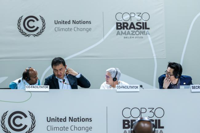 From L-R: Perumal Arumugam, UNFCCC Secretariat; Co-Facilitators for informal consultations on the Paris Agreement Article 6.4 mechanism Sonam Tashi, Bhutan, and Kate Hancock, Australia; and Kenjiro Suzuki, UNFCCC Secretariat