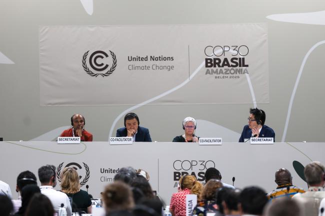 View of the dais during informal negotiations on the Paris Agreement Article 6.4 mechanism