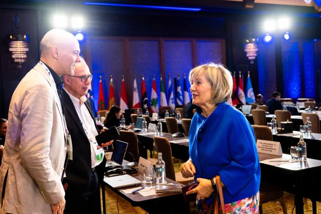 During a break, participants catch up and discuss oceans conservation