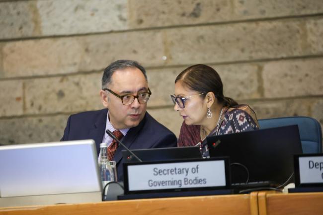 OECPR-7 Chair Sultan Hajiyev, Azerbaijan, consults with Radhika Ochalik, Secretary, Governing Bodies and Stakeholders, UNEP