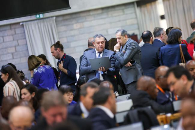 Delegates before the closing plenary 