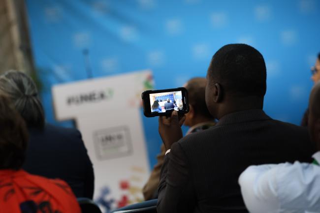 A participant takes a picture 