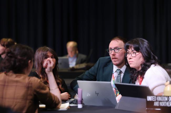 Delegates consult 