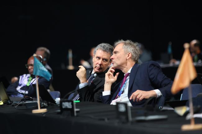 Delegates from the EU consult during the discussions in Working Group 1. 