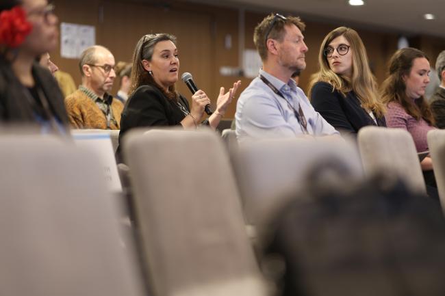 A participant asks a question during the Mountain Partnership Strategy Documents discussion