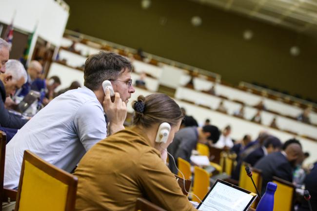 Delegates following the proceedings 