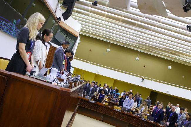 Delegates observe a minute of silence for Juan José González Mijares, Mexico and ISA-28 Council President, who passed away earlier today, 13 March 2026. 