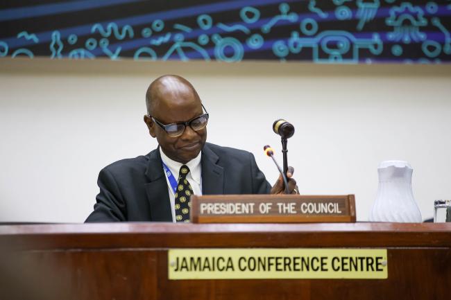 Outgoing Council President Duncan Muhumuza Laki, Uganda, gavels the opening of the 1st part of ISA-31. 