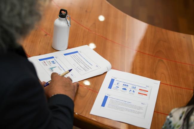 A participant takes notes 