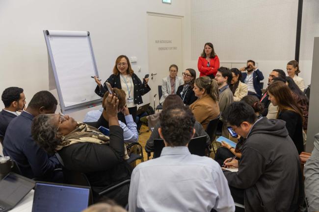 Delegates break out into group for more in-depth discussions