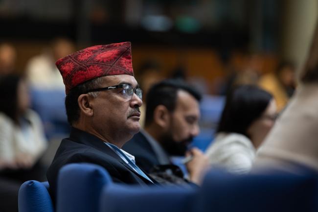 Delegates listen