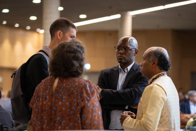 Delegates consult in the corridors as the first week of the June Climate Meetings nears it's close