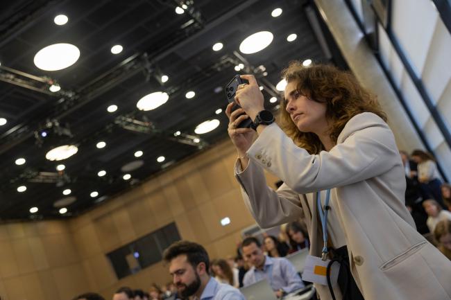 Delegate takes a photo