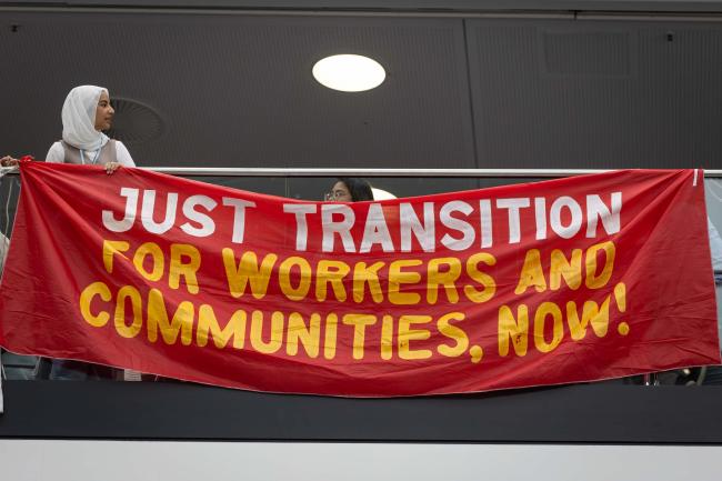 Members of civil society raise awareness about the need for a just transition