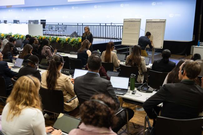 Delegates break out into group for more in-depth discussions