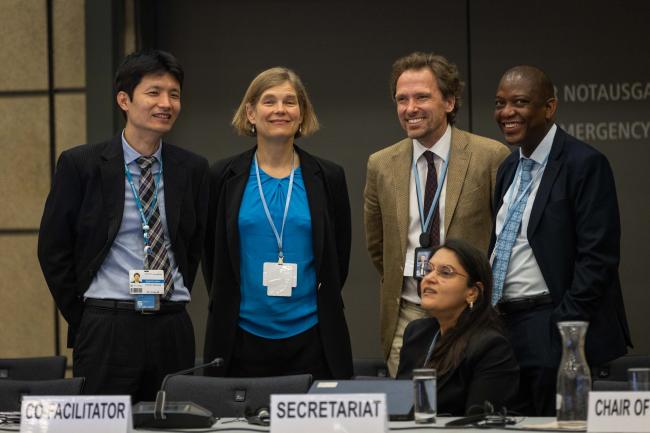 Co-Facilitators for the informal consultations on the mitigation work programme Ursula Fuentes Hutfilter, Germany, and Maesela John Kekana, South Africa, with the UNFCCC Secretariat, watch the huddles 