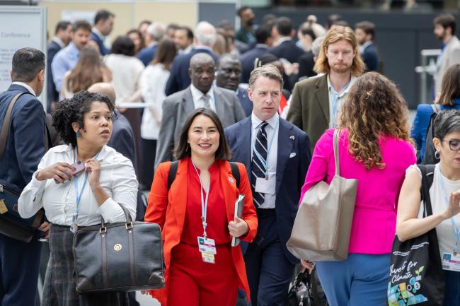 Delegates arrive for the start of the June Climate Meetings