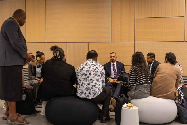 Sivendra Michael, Permanent Secretary, Ministry of Environment and Climate Change, Fiji, speaks with delegates 