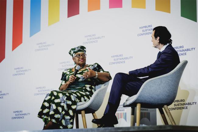 WTO Director-General Ngozi Okonjo-Iweala, and Ali Aslan, Moderator