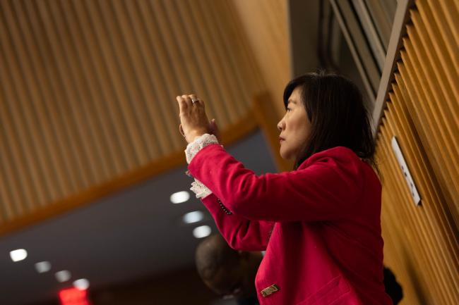 Delegate takes photo