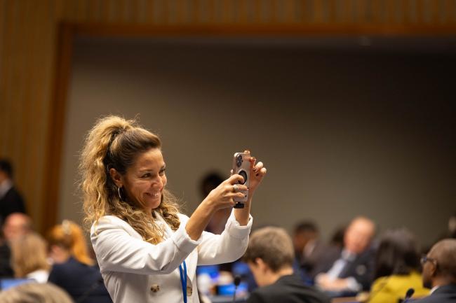 Delegate takes photo in VNRs