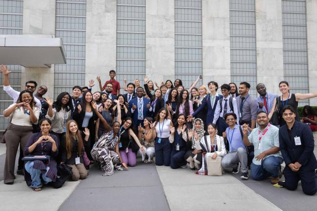 Family photo of the Major Group for Children and Youth (MGCY), who facilitated the participation of almost 400 young people at HLPF 2026
